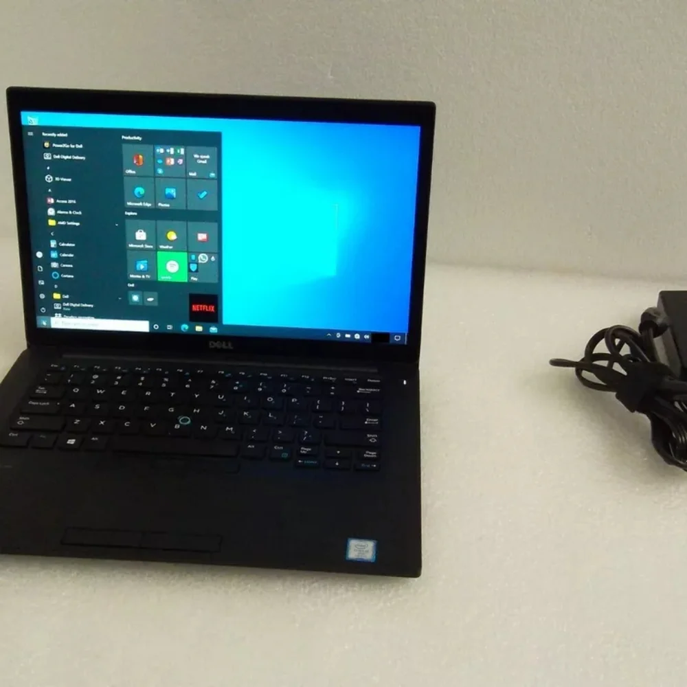 Dell Black Laptop with Windows 10 Display and Clamshell Design